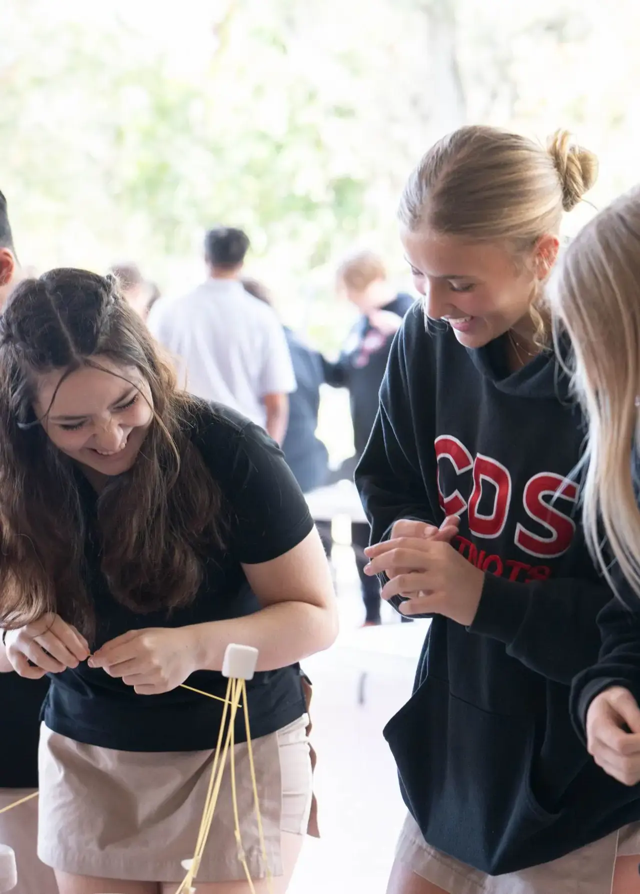 Smiling Upper School students