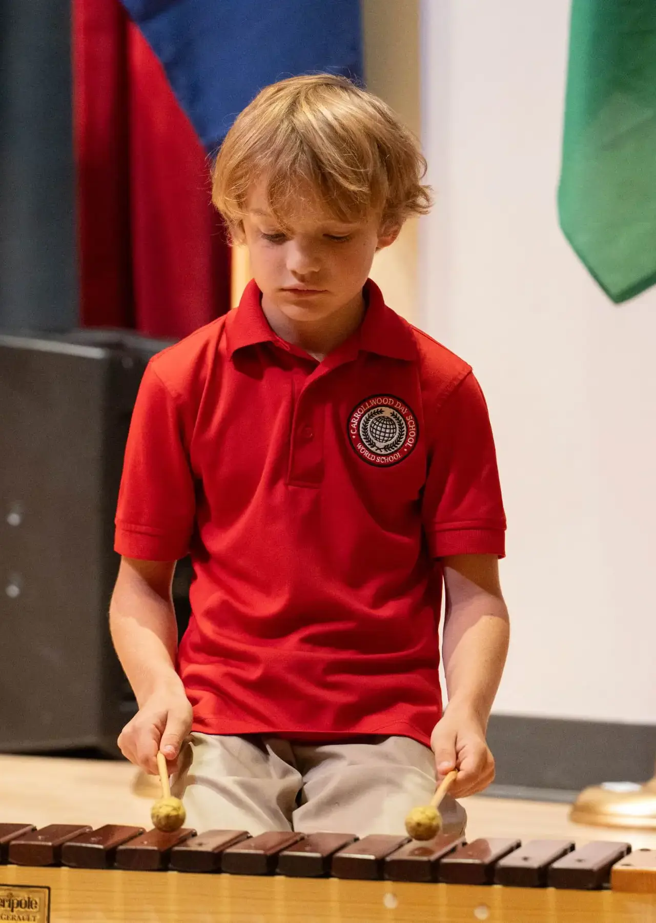 photo of elementary students playing music